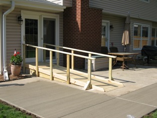HMI Remodeling-Hoske Maintenance-design, built, installed handicapped ramp to for patio access.