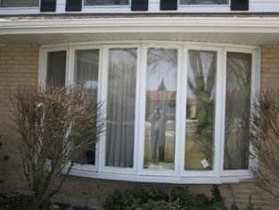 HMI Remodeling-Hoske Maintenance-removed and replaced old bow window with new Marvin insulated windows (including two casement windows that swing open).